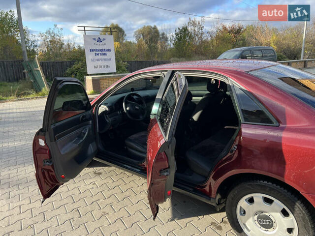 Красный Ауди А4, объемом двигателя 1.6 л и пробегом 226 тыс. км за 4300 $, фото 7 на Automoto.ua
