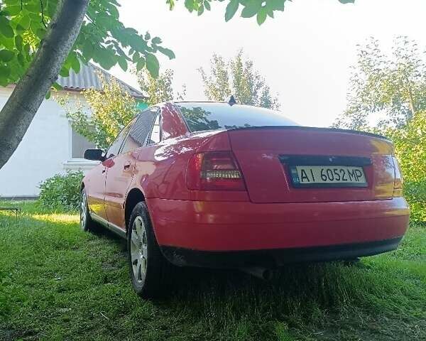 Красный Ауди А4, объемом двигателя 1.8 л и пробегом 285 тыс. км за 4500 $, фото 1 на Automoto.ua