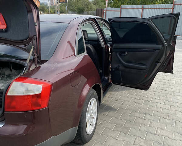 Красный Ауди А4, объемом двигателя 1.6 л и пробегом 240 тыс. км за 4800 $, фото 12 на Automoto.ua