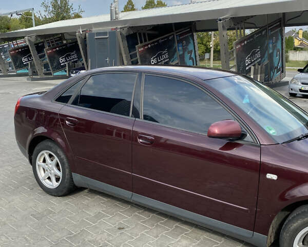 Красный Ауди А4, объемом двигателя 1.6 л и пробегом 240 тыс. км за 4800 $, фото 7 на Automoto.ua