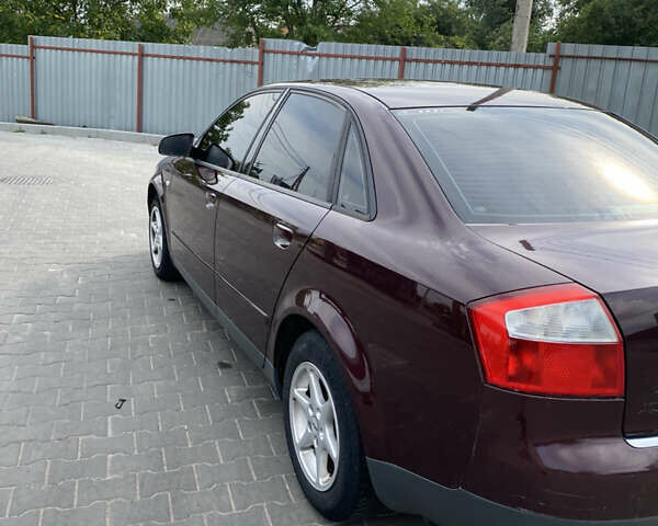 Красный Ауди А4, объемом двигателя 1.6 л и пробегом 240 тыс. км за 4800 $, фото 3 на Automoto.ua