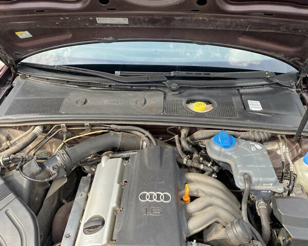 Красный Ауди А4, объемом двигателя 1.6 л и пробегом 240 тыс. км за 4800 $, фото 16 на Automoto.ua