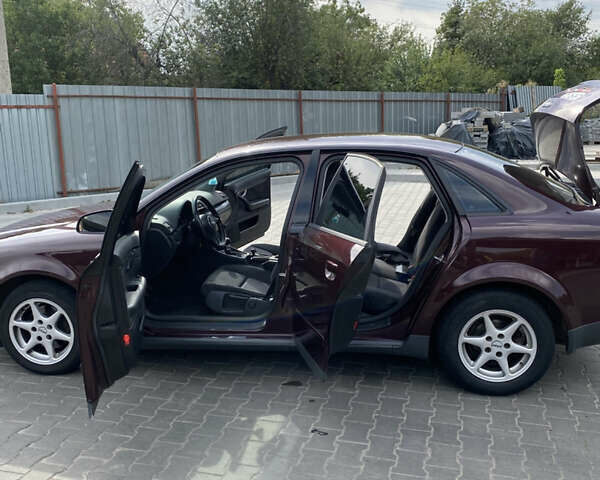 Красный Ауди А4, объемом двигателя 1.6 л и пробегом 240 тыс. км за 4800 $, фото 15 на Automoto.ua