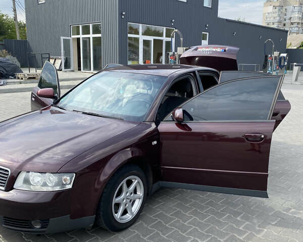 Красный Ауди А4, объемом двигателя 1.6 л и пробегом 240 тыс. км за 4800 $, фото 11 на Automoto.ua