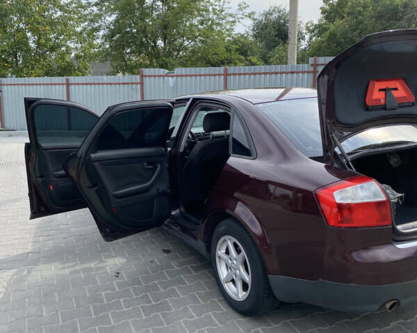 Красный Ауди А4, объемом двигателя 1.6 л и пробегом 240 тыс. км за 4800 $, фото 14 на Automoto.ua