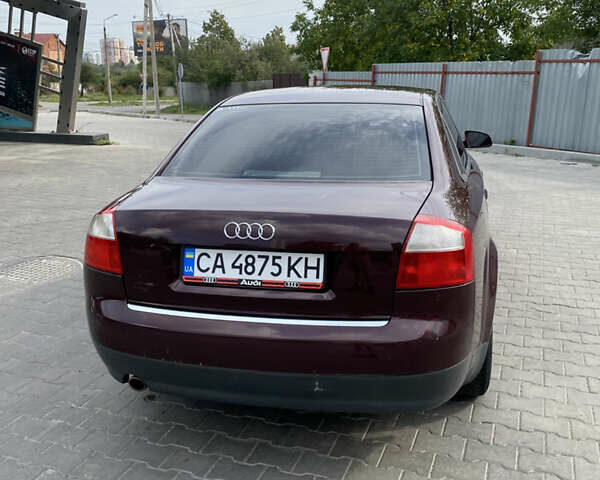 Красный Ауди А4, объемом двигателя 1.6 л и пробегом 240 тыс. км за 4800 $, фото 5 на Automoto.ua