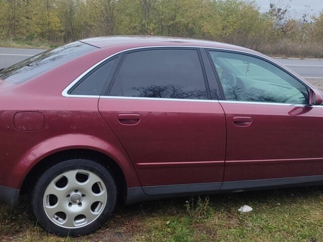 Красный Ауди А4, объемом двигателя 2 л и пробегом 265 тыс. км за 5200 $, фото 5 на Automoto.ua