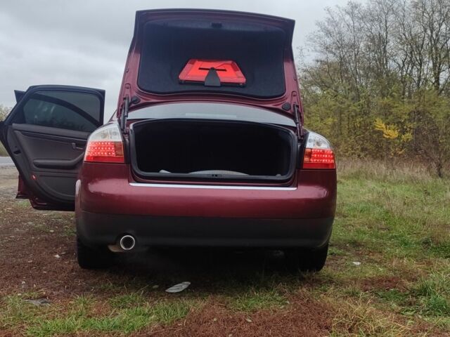 Красный Ауди А4, объемом двигателя 2 л и пробегом 265 тыс. км за 5200 $, фото 18 на Automoto.ua