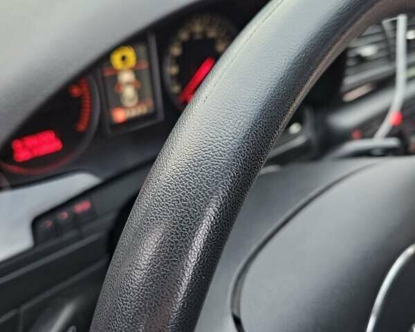 Красный Ауди А4, объемом двигателя 1.9 л и пробегом 255 тыс. км за 6500 $, фото 23 на Automoto.ua