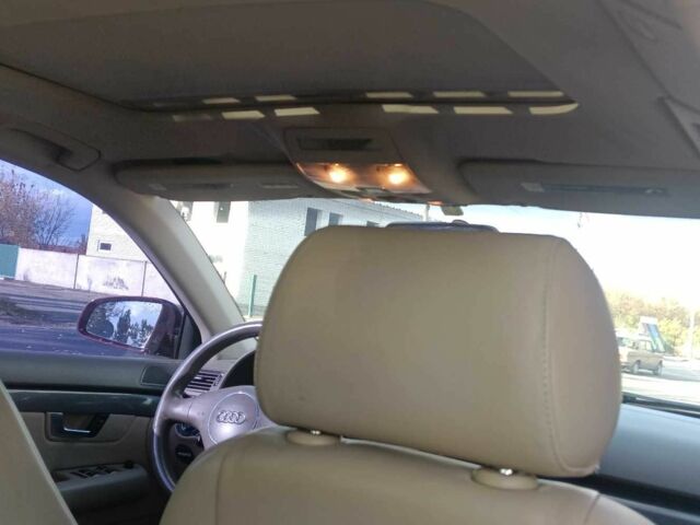 Красный Ауди А4, объемом двигателя 1.8 л и пробегом 268 тыс. км за 5700 $, фото 9 на Automoto.ua