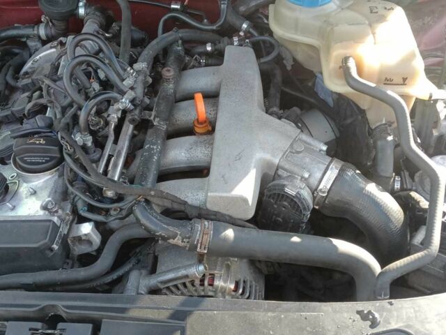 Красный Ауди А4, объемом двигателя 1.8 л и пробегом 268 тыс. км за 5700 $, фото 4 на Automoto.ua