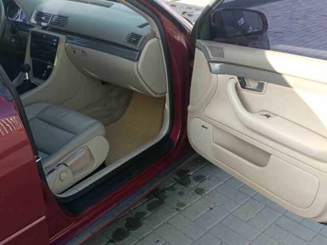 Красный Ауди А4, объемом двигателя 1.8 л и пробегом 268 тыс. км за 5700 $, фото 12 на Automoto.ua