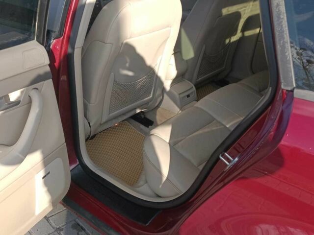 Красный Ауди А4, объемом двигателя 1.8 л и пробегом 268 тыс. км за 5700 $, фото 8 на Automoto.ua