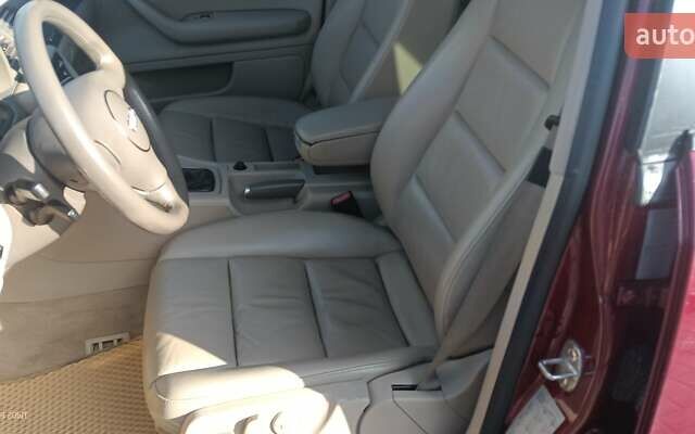 Красный Ауди А4, объемом двигателя 1.78 л и пробегом 268 тыс. км за 5700 $, фото 6 на Automoto.ua