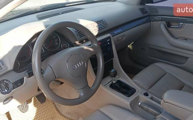 Красный Ауди А4, объемом двигателя 1.78 л и пробегом 268 тыс. км за 5700 $, фото 5 на Automoto.ua