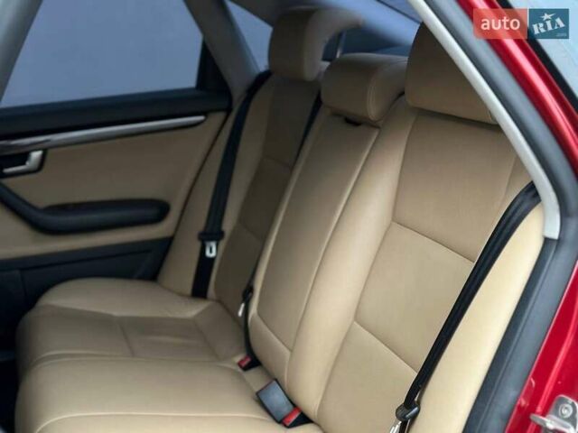 Красный Ауди А4, объемом двигателя 1.98 л и пробегом 229 тыс. км за 7300 $, фото 10 на Automoto.ua