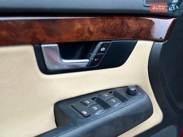 Красный Ауди А4, объемом двигателя 1.98 л и пробегом 229 тыс. км за 7300 $, фото 11 на Automoto.ua