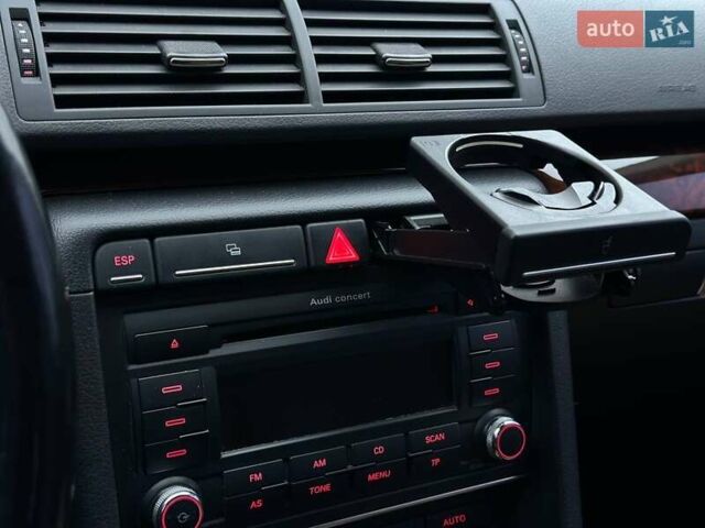 Красный Ауди А4, объемом двигателя 1.98 л и пробегом 229 тыс. км за 7300 $, фото 22 на Automoto.ua