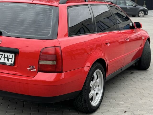 Красный Ауди А4, объемом двигателя 1.6 л и пробегом 315 тыс. км за 3350 $, фото 5 на Automoto.ua