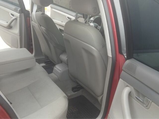 Красный Ауди А4, объемом двигателя 2 л и пробегом 280 тыс. км за 5500 $, фото 1 на Automoto.ua