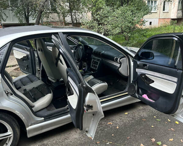 Сірий Ауді А4, об'ємом двигуна 1.8 л та пробігом 329 тис. км за 2000 $, фото 4 на Automoto.ua