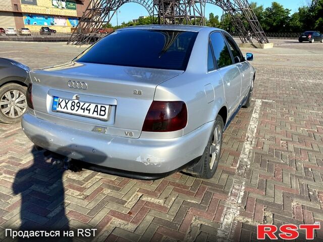 Серый Ауди А4, объемом двигателя 2.8 л и пробегом 200 тыс. км за 2500 $, фото 1 на Automoto.ua