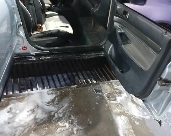 Серый Ауди А4, объемом двигателя 1.78 л и пробегом 50 тыс. км за 2200 $, фото 1 на Automoto.ua