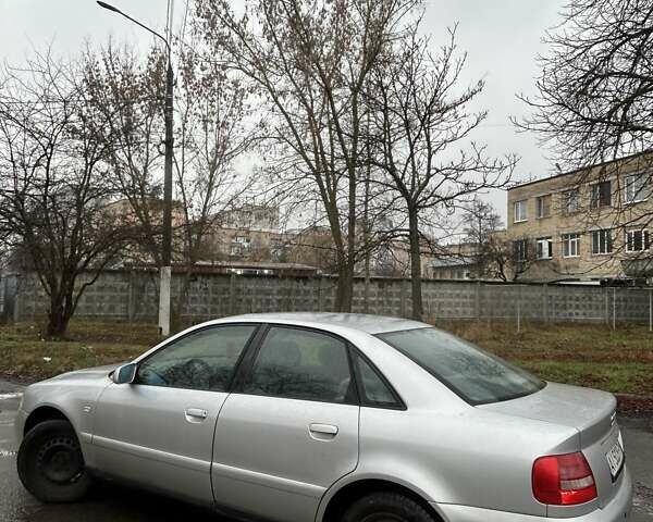 Серый Ауди А4, объемом двигателя 1.6 л и пробегом 341 тыс. км за 3650 $, фото 5 на Automoto.ua