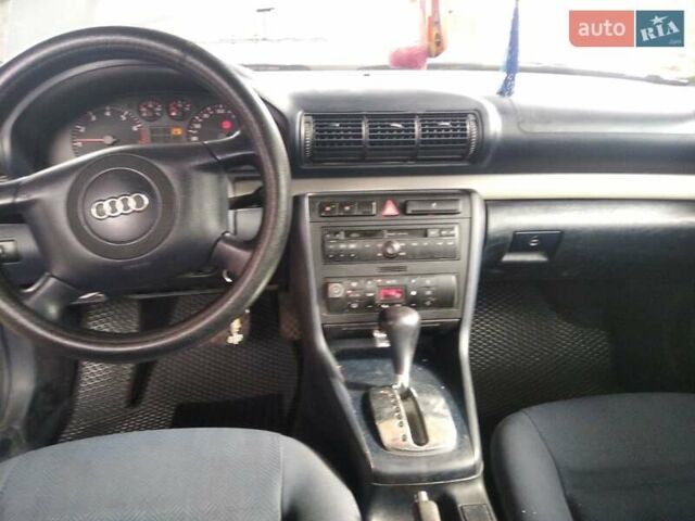 Серый Ауди А4, объемом двигателя 1.8 л и пробегом 210 тыс. км за 3500 $, фото 6 на Automoto.ua