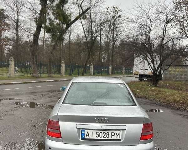 Серый Ауди А4, объемом двигателя 1.6 л и пробегом 341 тыс. км за 3650 $, фото 6 на Automoto.ua