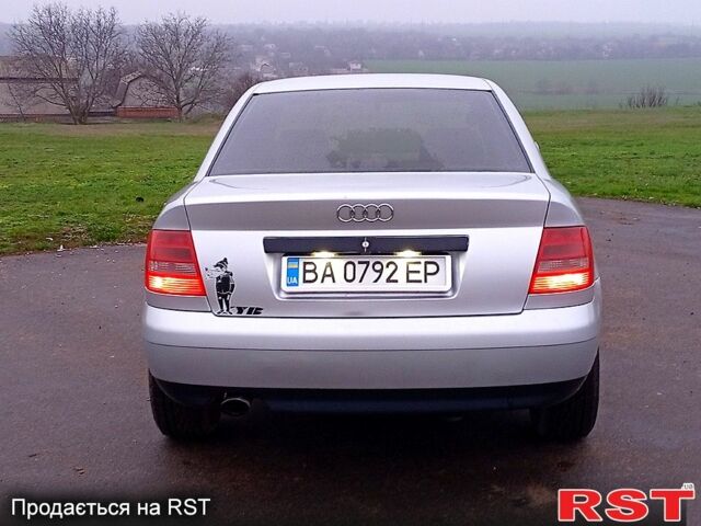 Серый Ауди А4, объемом двигателя 1.6 л и пробегом 225 тыс. км за 3700 $, фото 4 на Automoto.ua