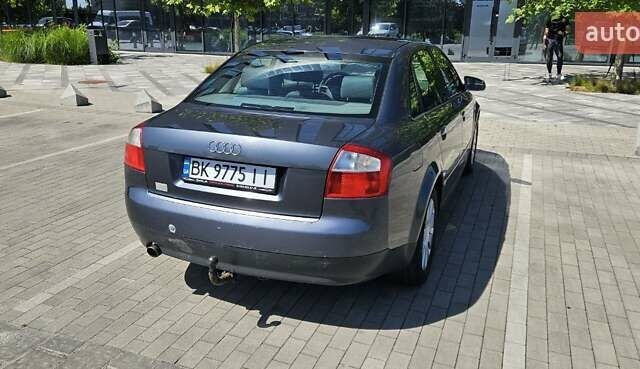 Сірий Ауді А4, об'ємом двигуна 2 л та пробігом 247 тис. км за 4700 $, фото 4 на Automoto.ua
