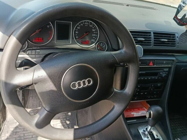 Сірий Ауді А4, об'ємом двигуна 2 л та пробігом 285 тис. км за 4800 $, фото 4 на Automoto.ua