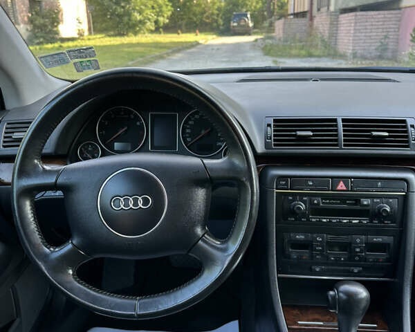 Сірий Ауді А4, об'ємом двигуна 2 л та пробігом 202 тис. км за 5850 $, фото 5 на Automoto.ua