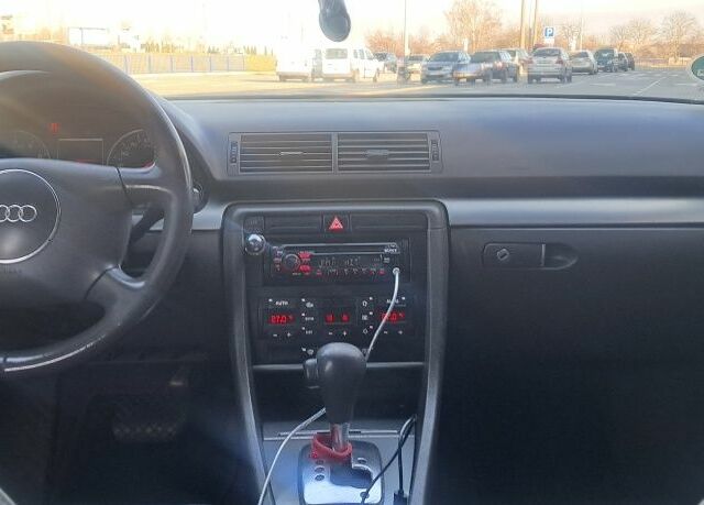 Сірий Ауді А4, об'ємом двигуна 2 л та пробігом 310 тис. км за 4300 $, фото 4 на Automoto.ua