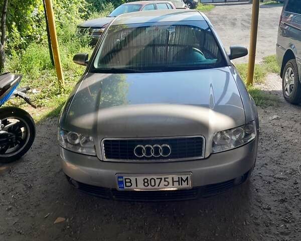 Серый Ауди А4, объемом двигателя 2 л и пробегом 350 тыс. км за 4800 $, фото 2 на Automoto.ua