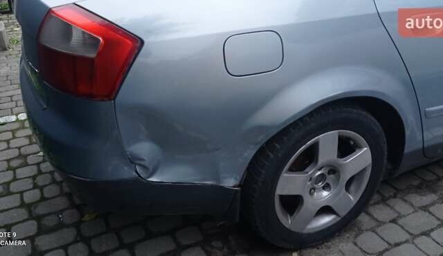 Сірий Ауді А4, об'ємом двигуна 1.9 л та пробігом 348 тис. км за 5499 $, фото 4 на Automoto.ua