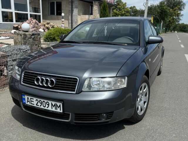 Серый Ауди А4, объемом двигателя 2 л и пробегом 244 тыс. км за 5900 $, фото 1 на Automoto.ua