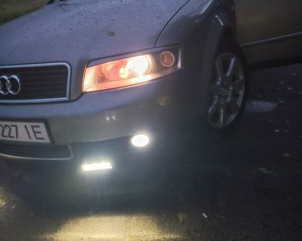 Сірий Ауді А4, об'ємом двигуна 1.6 л та пробігом 245 тис. км за 6500 $, фото 2 на Automoto.ua