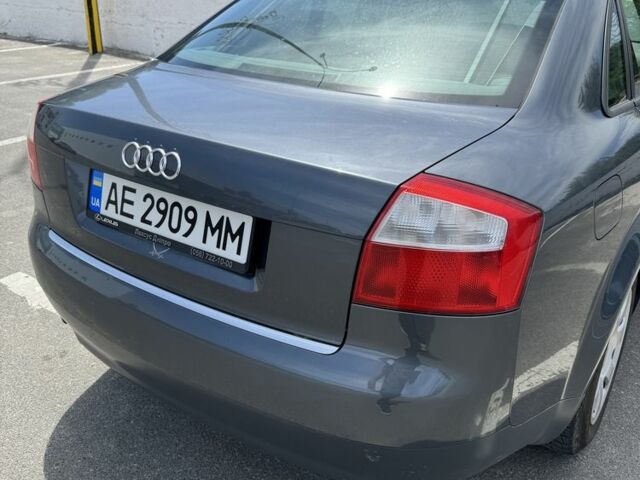 Серый Ауди А4, объемом двигателя 2 л и пробегом 244 тыс. км за 5900 $, фото 2 на Automoto.ua