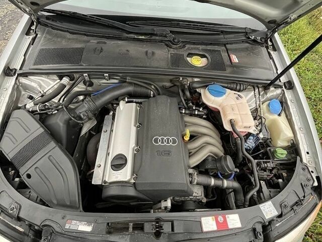 Сірий Ауді А4, об'ємом двигуна 1.6 л та пробігом 185 тис. км за 5308 $, фото 4 на Automoto.ua