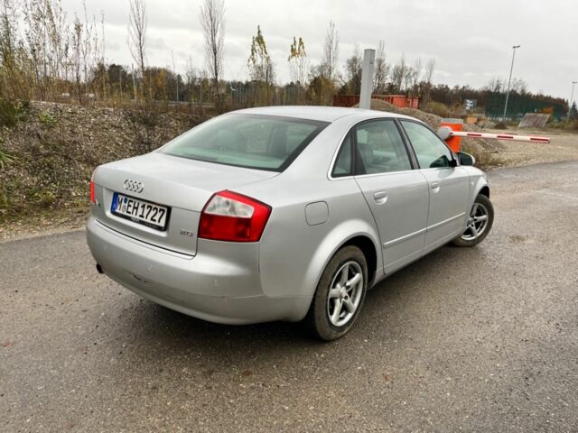 Серый Ауди А4, объемом двигателя 2 л и пробегом 236 тыс. км за 1310 $, фото 1 на Automoto.ua