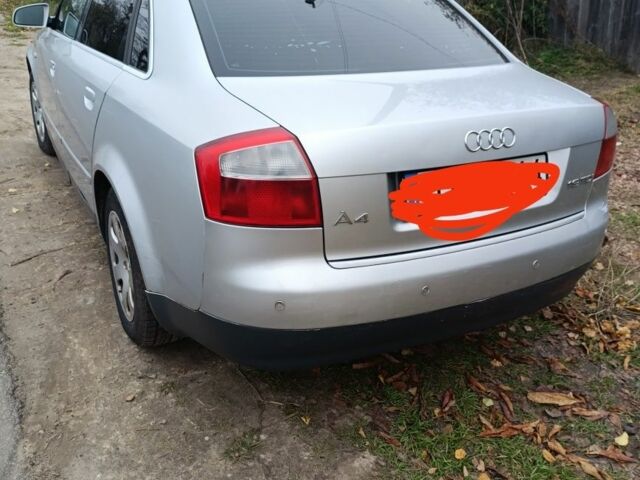 Сірий Ауді А4, об'ємом двигуна 2 л та пробігом 406 тис. км за 3400 $, фото 4 на Automoto.ua