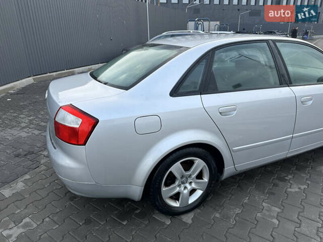 Серый Ауди А4, объемом двигателя 2 л и пробегом 233 тыс. км за 4850 $, фото 1 на Automoto.ua