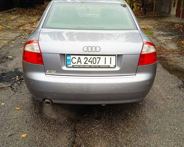Сірий Ауді А4, об'ємом двигуна 2 л та пробігом 211 тис. км за 5900 $, фото 2 на Automoto.ua