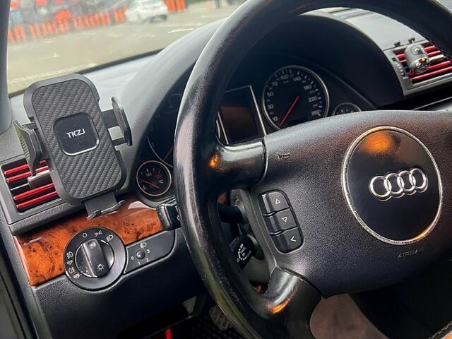Сірий Ауді А4, об'ємом двигуна 2 л та пробігом 275 тис. км за 5800 $, фото 4 на Automoto.ua