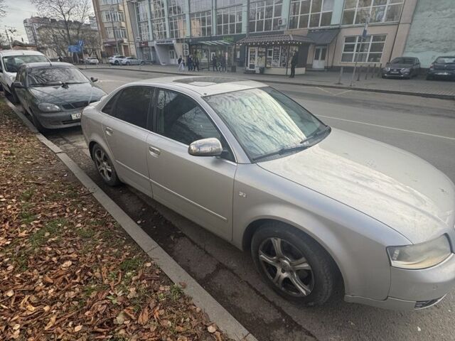Серый Ауди А4, объемом двигателя 2 л и пробегом 200 тыс. км за 5500 $, фото 1 на Automoto.ua