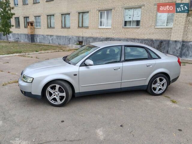 Сірий Ауді А4, об'ємом двигуна 1.6 л та пробігом 210 тис. км за 6000 $, фото 1 на Automoto.ua