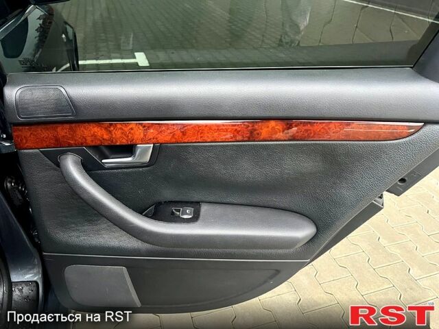 Сірий Ауді А4, об'ємом двигуна 2 л та пробігом 275 тис. км за 5800 $, фото 12 на Automoto.ua