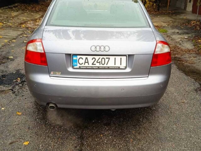 Серый Ауди А4, объемом двигателя 2 л и пробегом 211 тыс. км за 5900 $, фото 2 на Automoto.ua